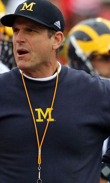 Quirky Harbaugh making football fun again at Michigan